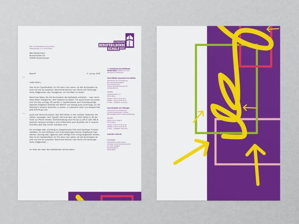 Zweiseitiges Briefpapier der Katholischen Berufsbildenden Schule Mainz mit Text auf der linken Seite und buntem grafischem Design auf der rechten Seite.